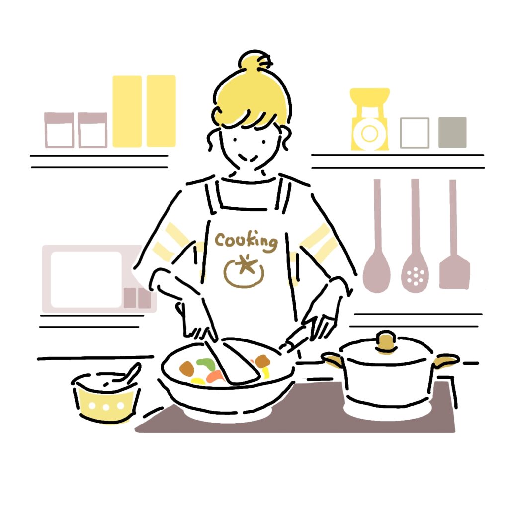 料理をしている女性